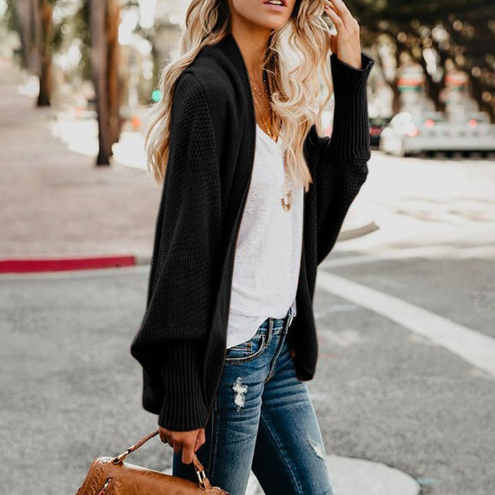 Soft women's relaxed fit cardigan, perfect for everyday comfort and chic outerwear style.