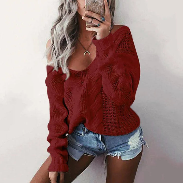 Women's oversized knit sweater. Long sleeve, round neck. Cozy, comfortable & stylish for fall/winter.