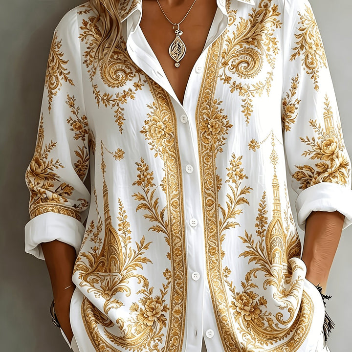 Elegant women's oversized floral paisley long sleeve top. Versatile button-down shirt for casual fashion.