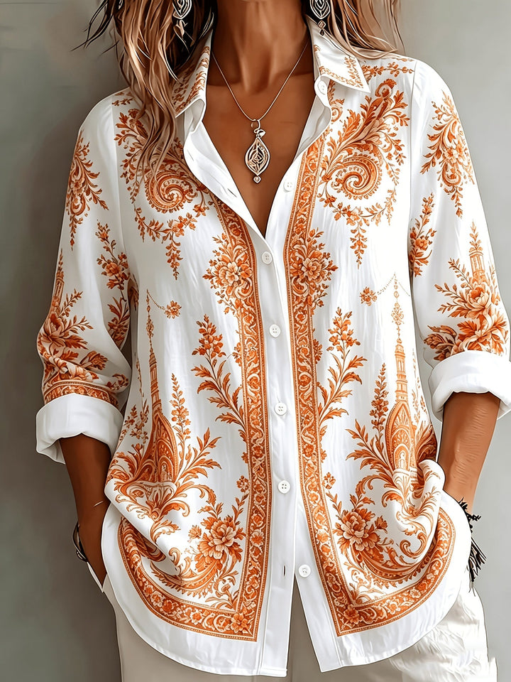 Stylish women's long sleeve button-down blouse, oversized fit, featuring a beautiful floral paisley pattern.