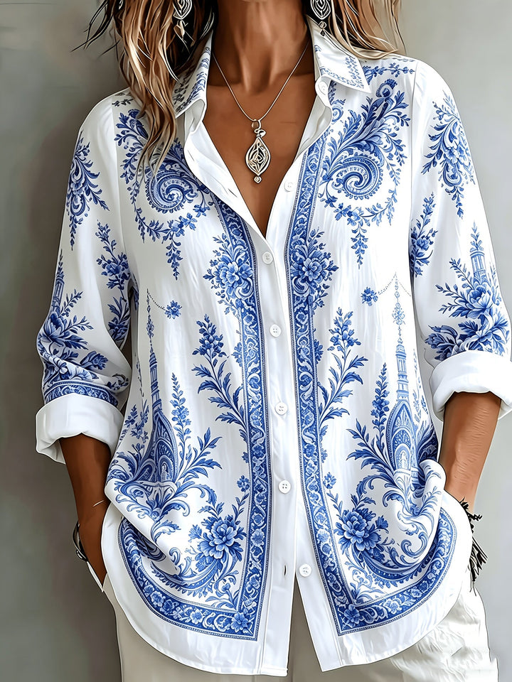 Elegant women's oversized long sleeve blouse showcasing a beautiful floral paisley print. Casual & stylish.