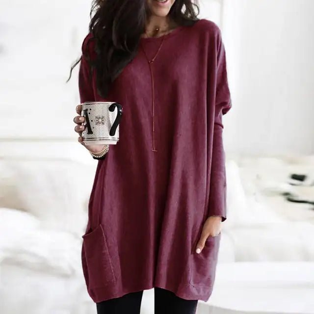 Women's oversized long sleeve tunic top with pockets, perfect for casual comfort & everyday wear.
