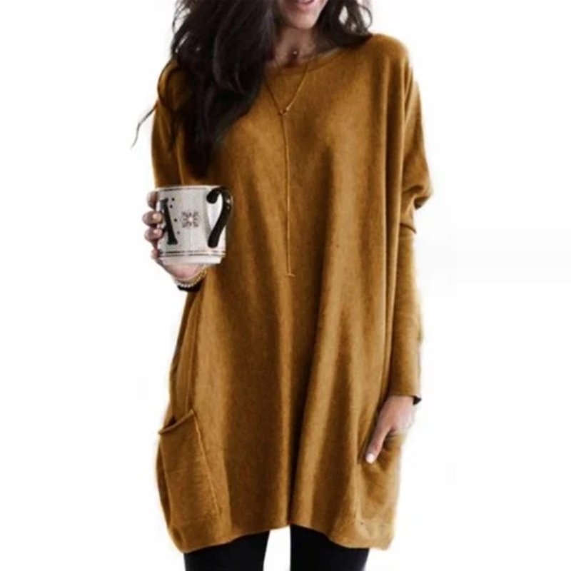 Cozy oversized women's top with long sleeves & pockets, versatile for casual occasions & loungewear.