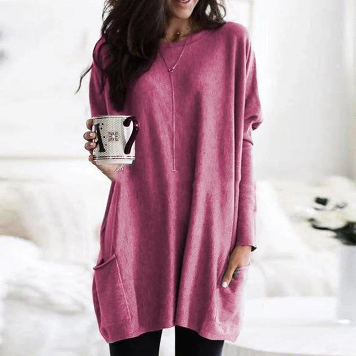 Relaxed fit women's tunic, long sleeves & pockets, essential for work from home or loungewear.