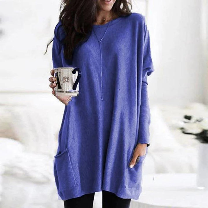 Women's casual oversized long sleeve tunic with side pockets, cozy winter fashion & comfort.