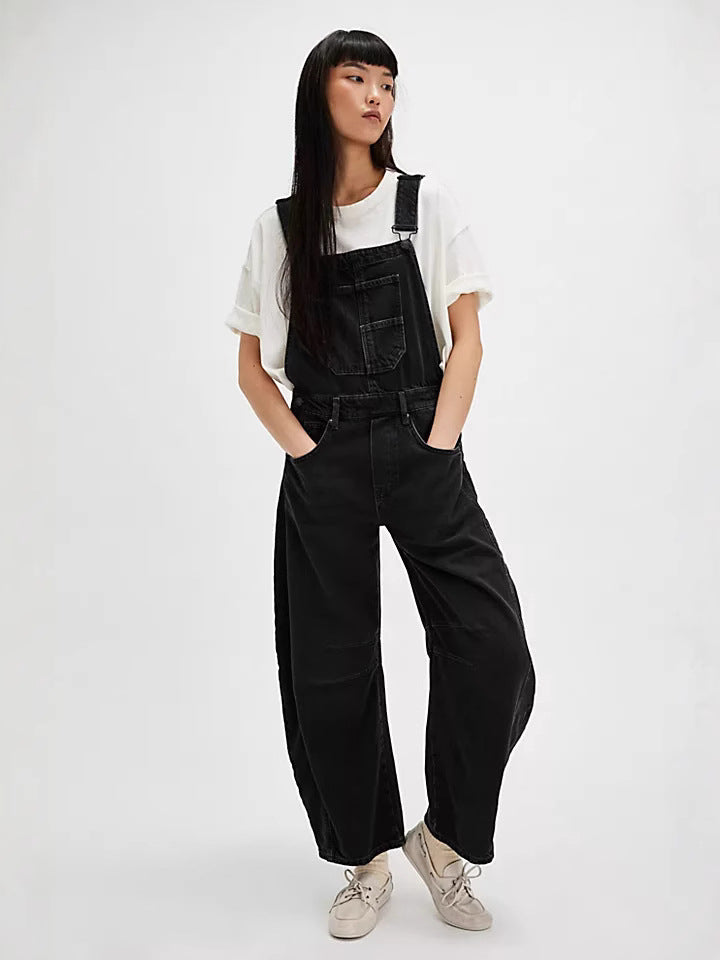 Relaxed fit women's oversized denim overalls, comfortable casual jumpsuit with practical pockets for everyday wear.