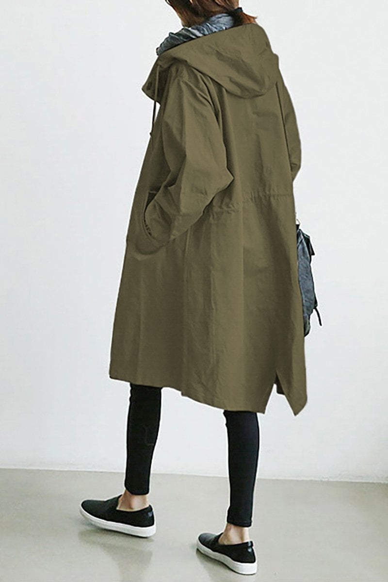 Spring/Fall women's oversized rain parka. Water-resistant trench coat for stylish, casual layering.