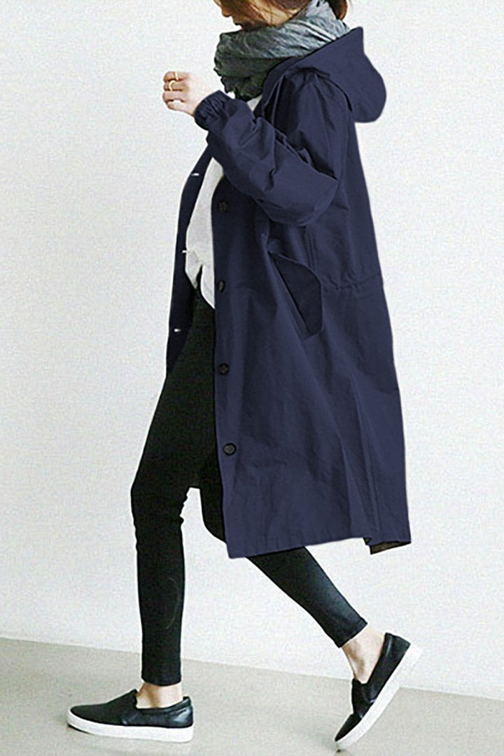 Women's oversized water-resistant rain parka. Chic trench coat, ideal for spring & fall layering.