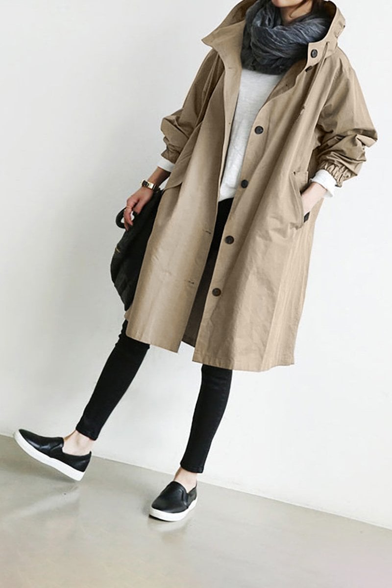 Casual women's oversized rain trench coat. Water-resistant parka, stylish outerwear for spring/fall.