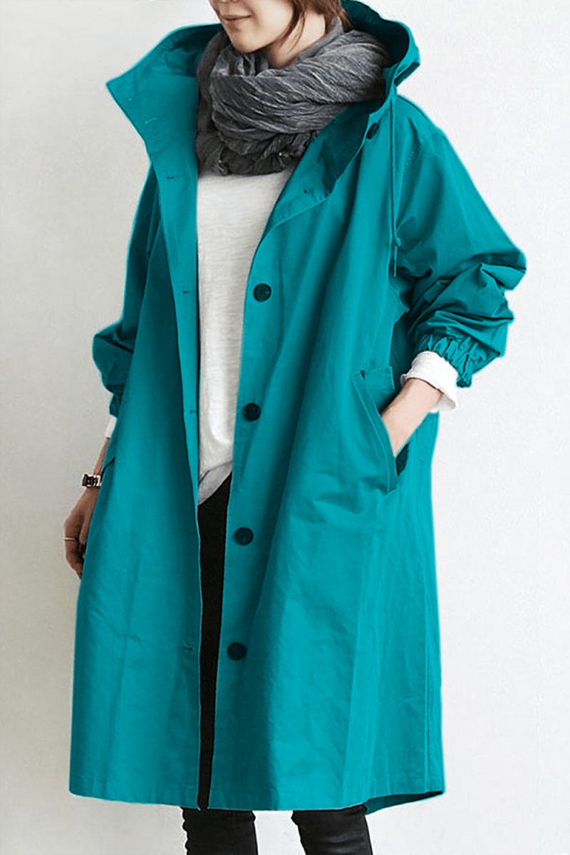 Fashionable women's oversized rain trench coat. Water-resistant parka, great for spring/fall casual wear.