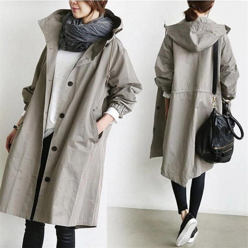 Modern women's oversized rain coat. Water-resistant trench parka, ideal for spring/fall layering & chic style.