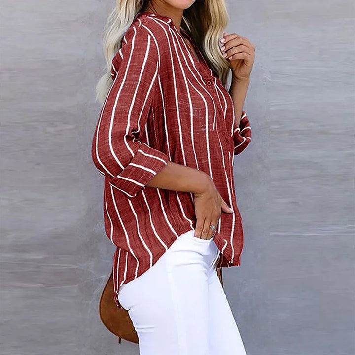 Effortlessly stylish women's oversized long sleeve striped top. A versatile button-down for chic casual wear.