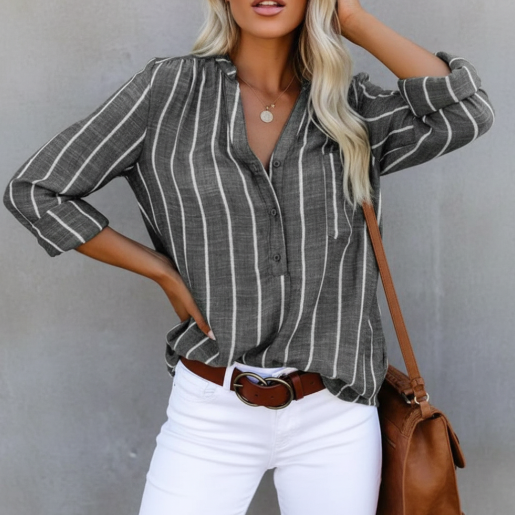 Everyday classic: women's oversized striped long sleeve shirt. A chic button-down top for versatile casual looks.
