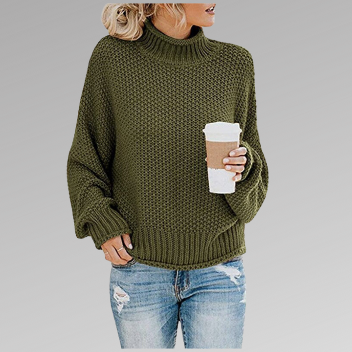 Cozy women's oversized turtleneck sweater in comfortable knit, perfect for casual everyday style.