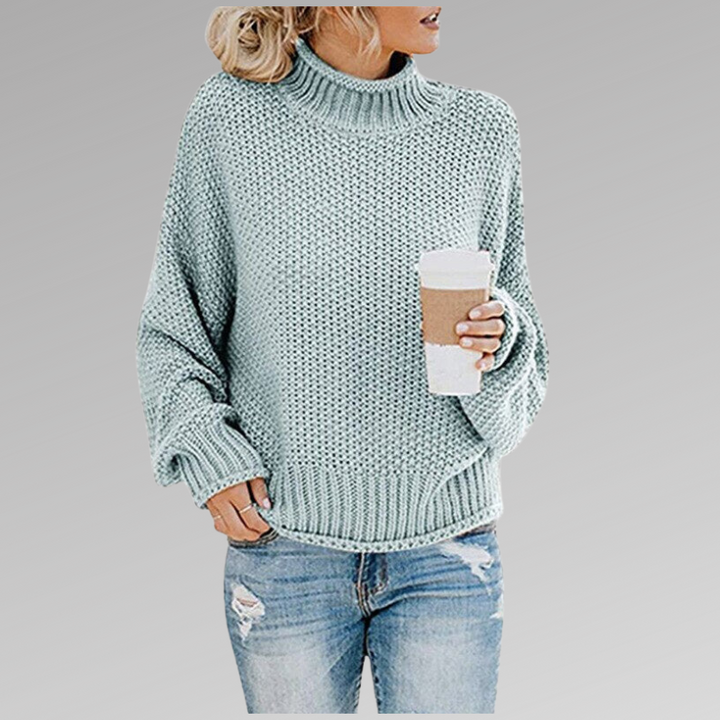 Ultra-cozy women's oversized turtleneck sweater, perfect for comfortable casual wear & layering.