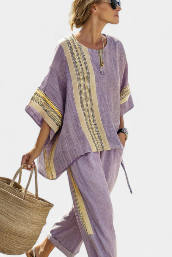 Comfortable women's oversized loungewear set featuring subtle embroidery & stylish stripe trim.
