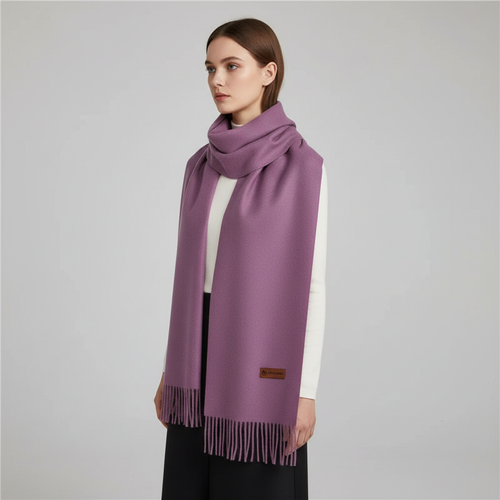 Versatile oversized women's scarf, providing warmth and elegance, a staple winter accessory.