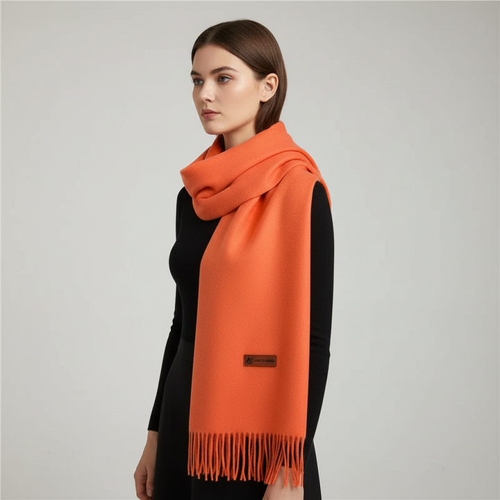 Plush, soft women's oversized winter scarf with beautiful fringe; a perfect warm fashion accessory.