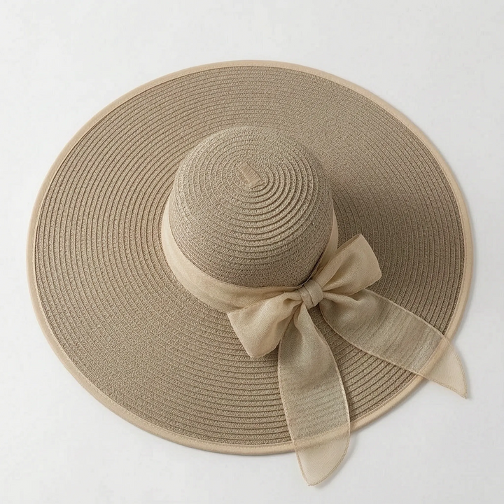 Stylish oversized wide brim hat for women, essential resort wear for chic summer vacation fashion.