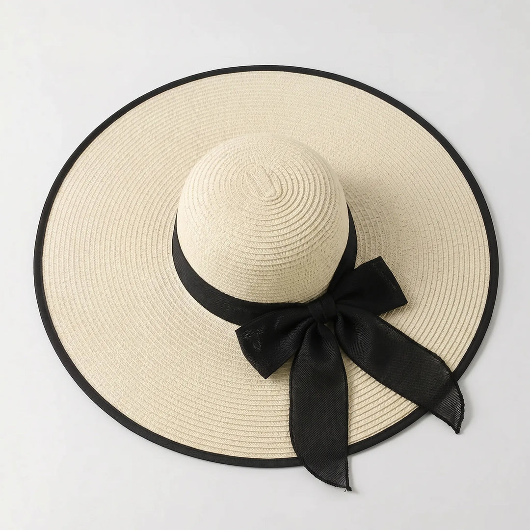 Fashionable women's wide brim sun hat, perfect for beach, pool, travel, or any sunny summer day.