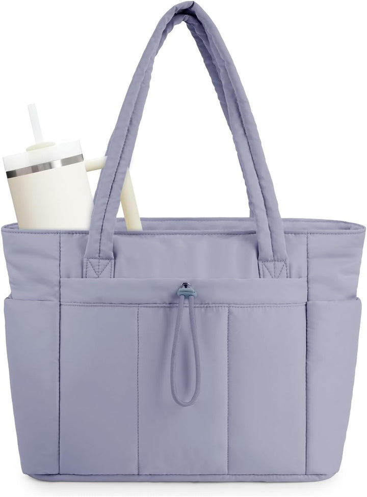 Lightweight women's padded travel tote, featuring laptop sleeve & cup holder.