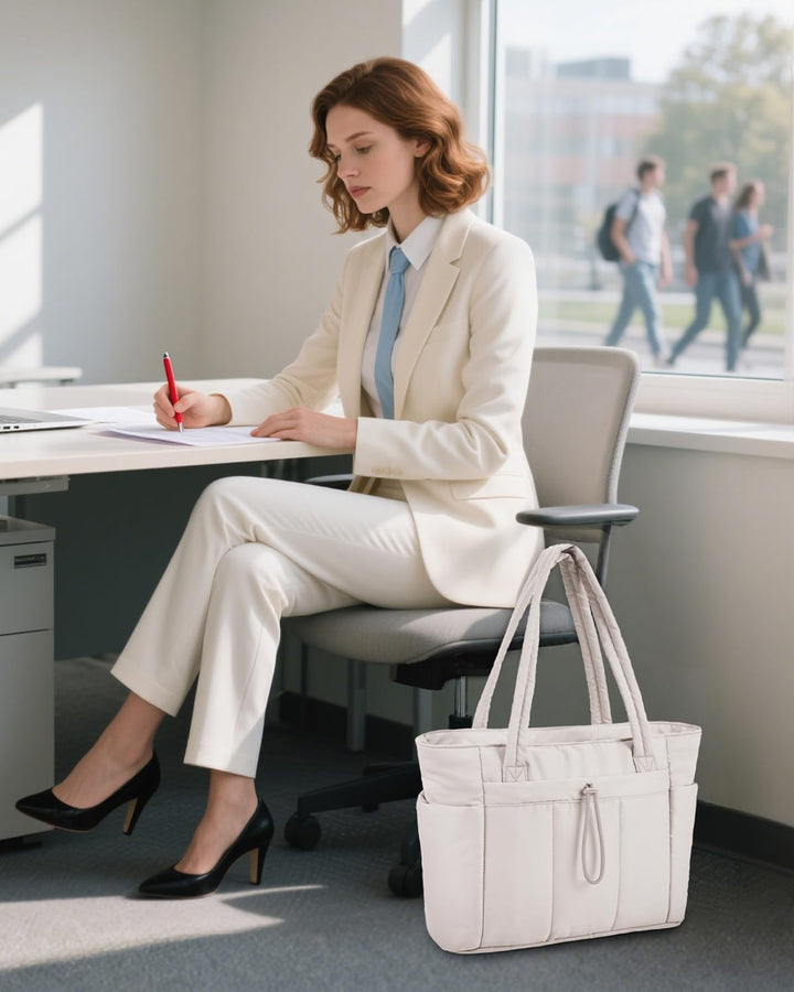 Perfect women's work bag: padded laptop sleeve, cup holder, & spacious interior.