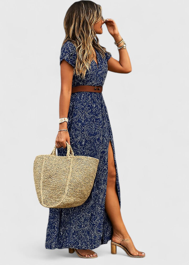 Women's paisley print maxi dress with V-neck, short sleeves, and self-tie belt. Perfect boho summer style.
