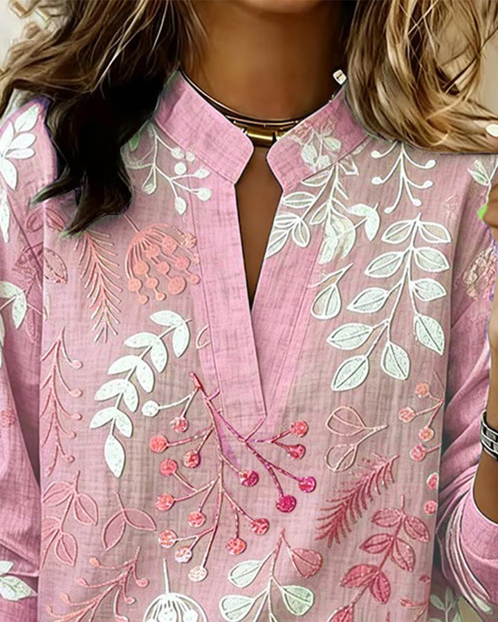 Stylish pink & blue pastel floral v-neck women's blouse, versatile for all seasons.