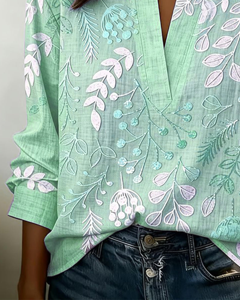 Grey pastel floral v-neck women's blouse, a timeless choice for versatile fashion.