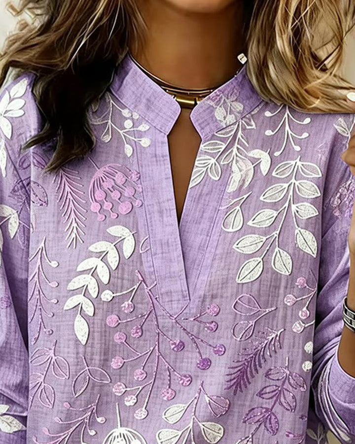 Comfortable purple pastel floral v-neck blouse for women, great for spring style.