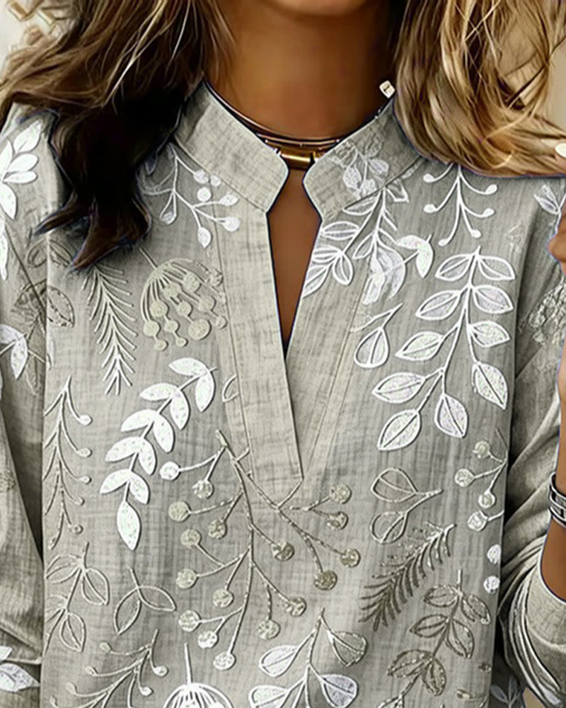 Relaxed fit women's pastel floral v-neck blouse, comfortable & stylish for daily wear.