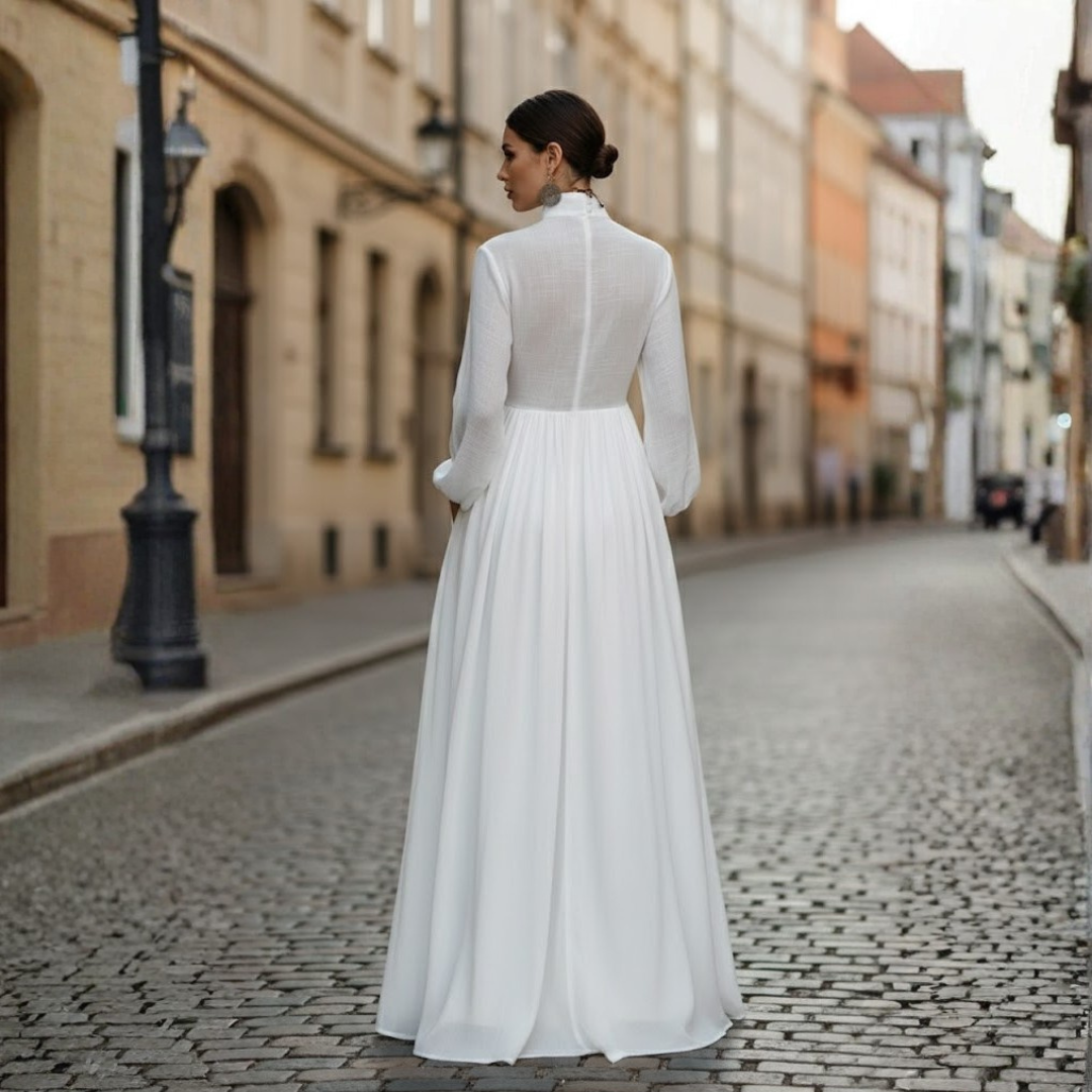 Modest women's long sleeve maxi dress with a unique patchwork design & high neckline, ideal for fall/spring wear.
