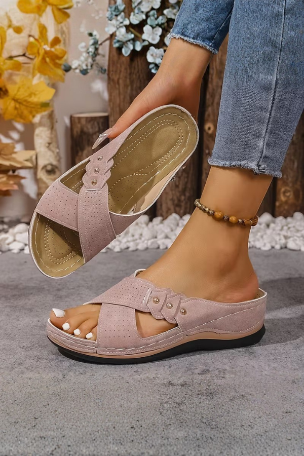 Chic women's perforated wedge slip-on sandals, stylish & comfortable casual footwear for summer.