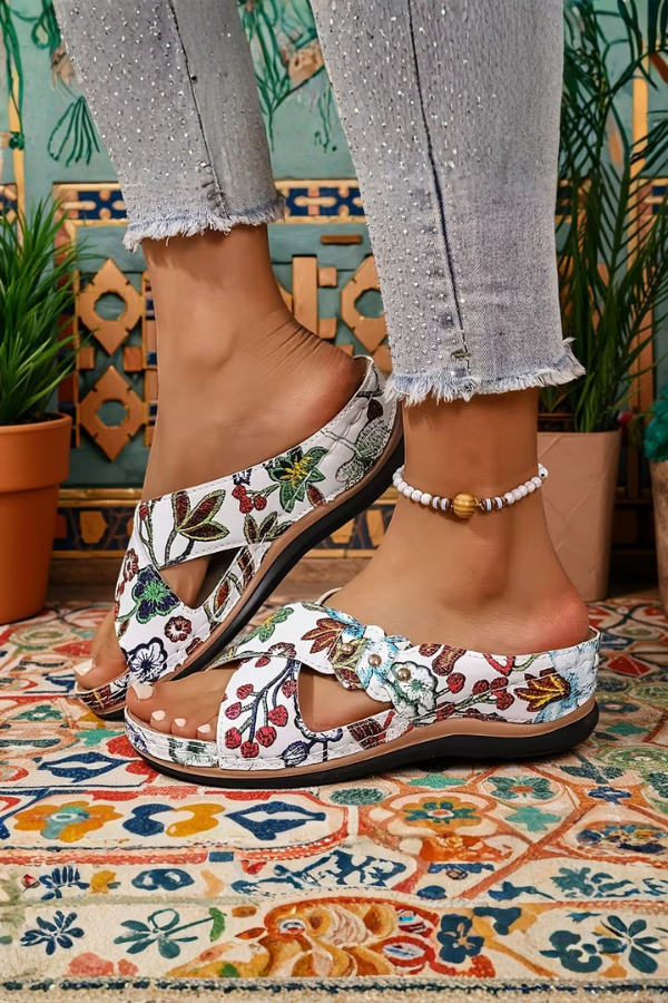 Breathable women's perforated slip-on wedge sandals, lightweight & comfy for all-day summer casual wear.