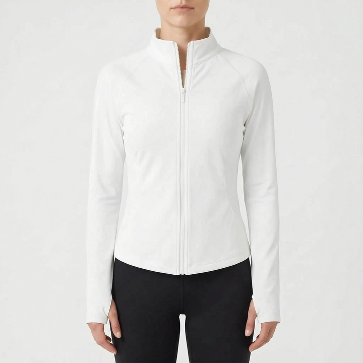 Woman wearing a black slim fit performance jacket, actively running outdoors for fitness.