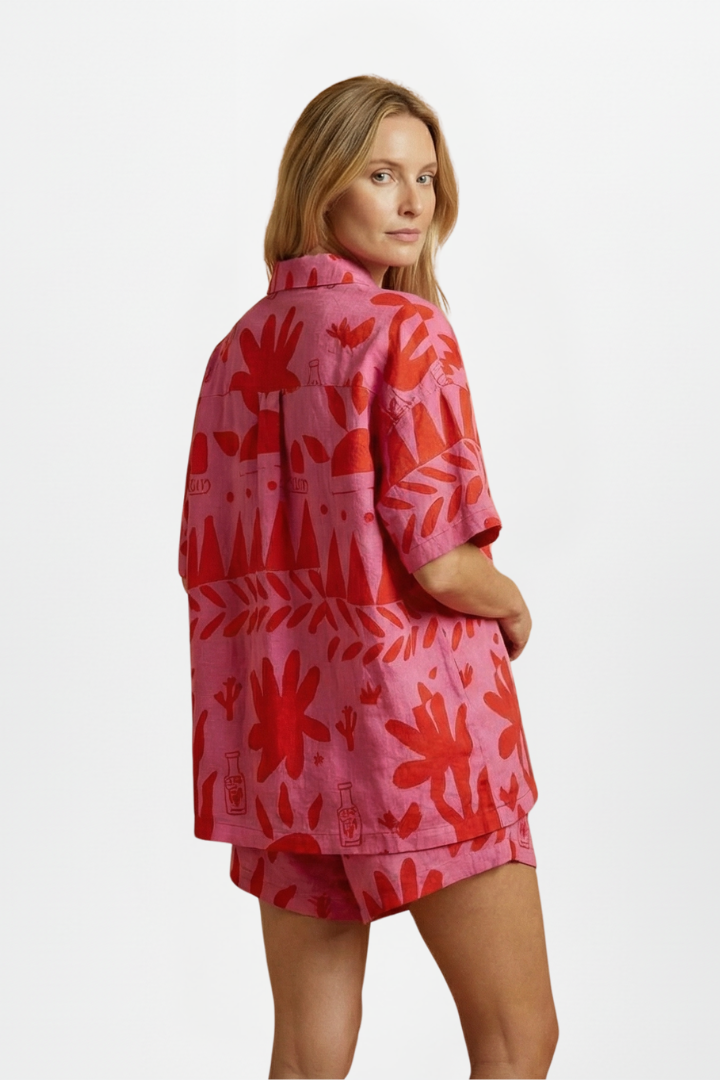 Stylish women's pink tropical print camp collar shirt and shorts set. Ideal for summer resort wear & beach outfits.