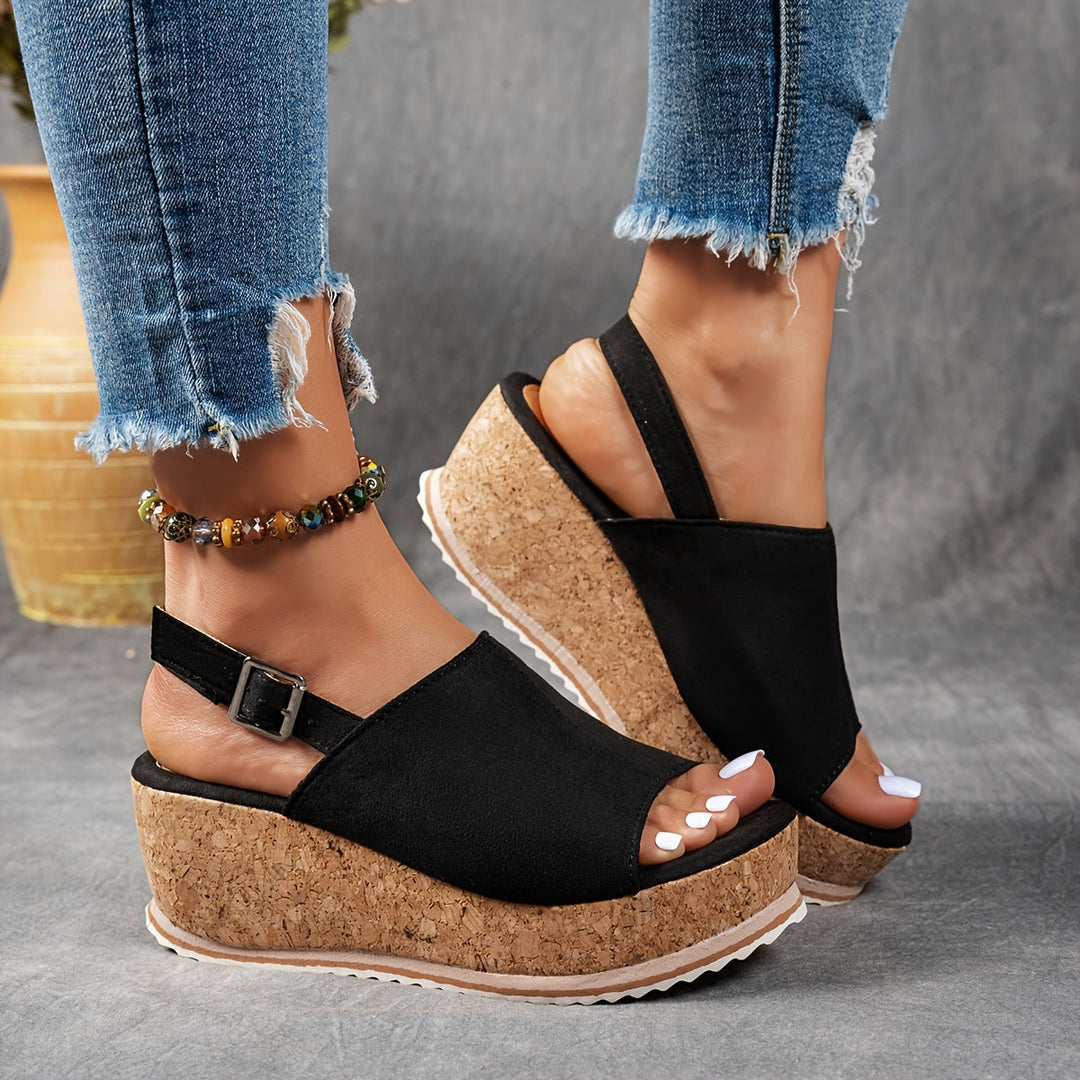 Women's platform adjustable sandals with buckle closure, perfect for comfortable summer wear.