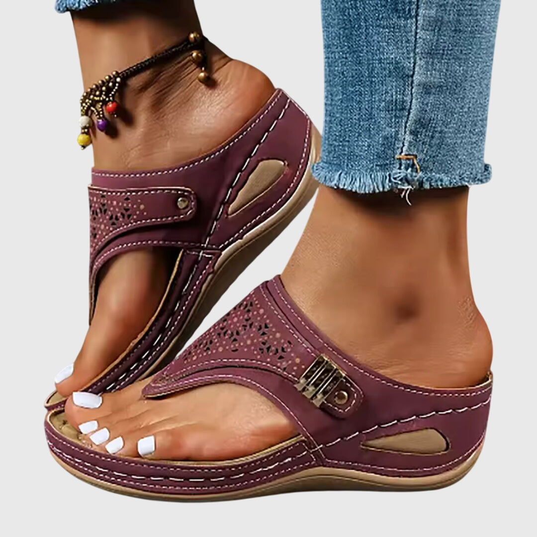 Fashion-forward women's platform sandals with ankle strap, perforated design, and chunky heel for summer.
