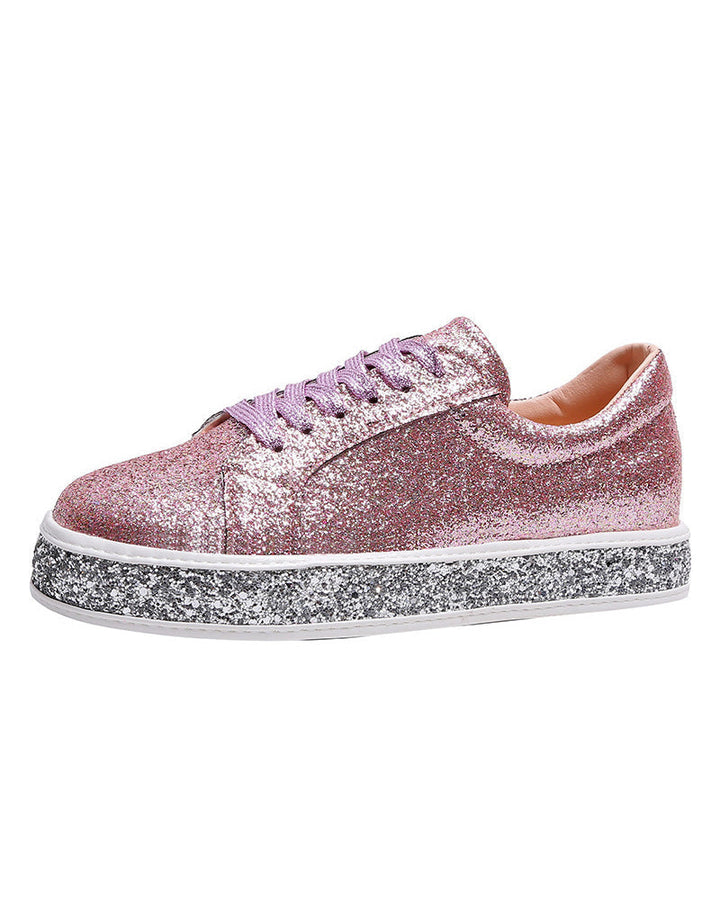 Fashionable women's platform glitter sneakers, combining sparkle, comfort, and modern style.