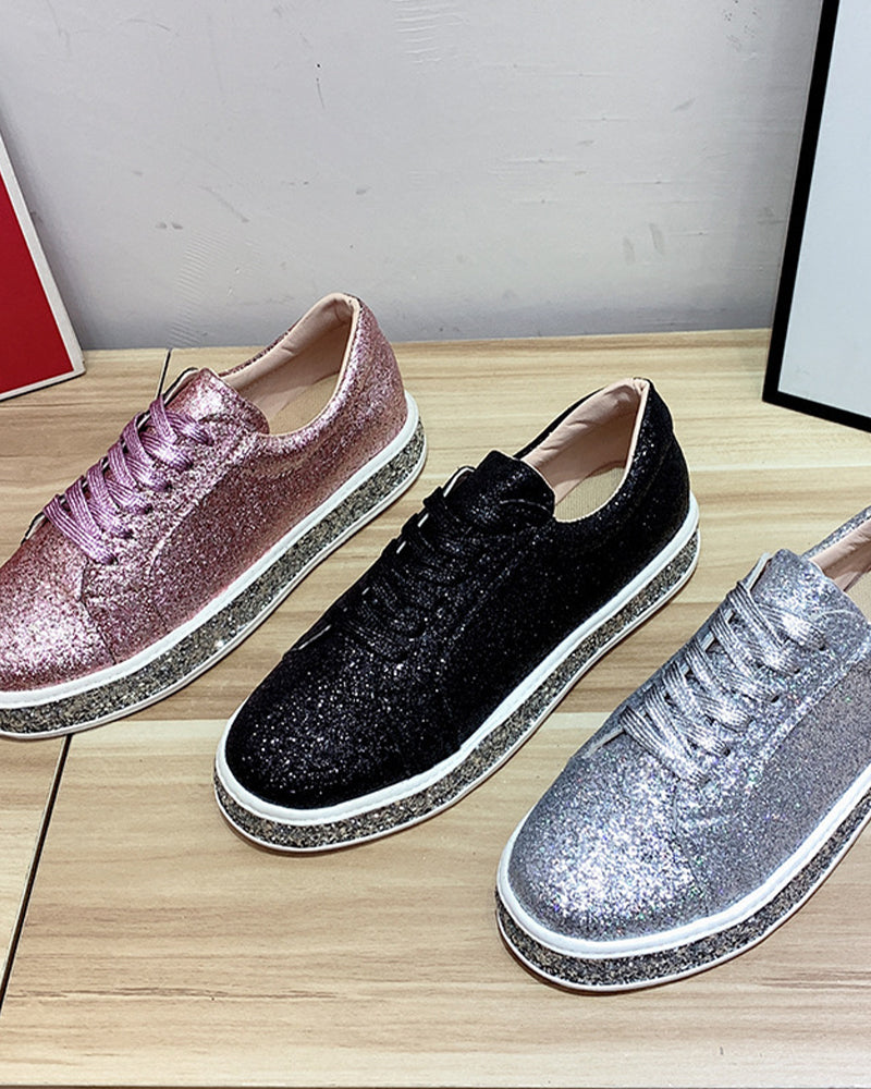 Eye-catching women's sparkle sneakers with platform sole, a chic statement for any outfit.
