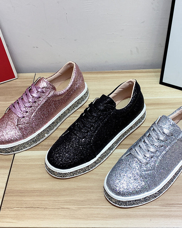 Eye-catching women's sparkle sneakers with platform sole, a chic statement for any outfit.
