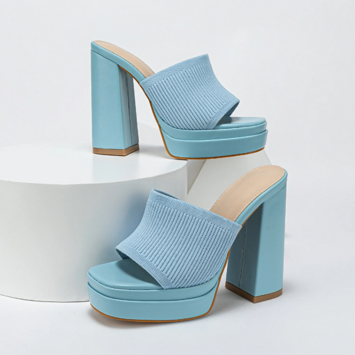 Women's comfort platform sandals, featuring adjustable straps & open-toe design for summer footwear.
