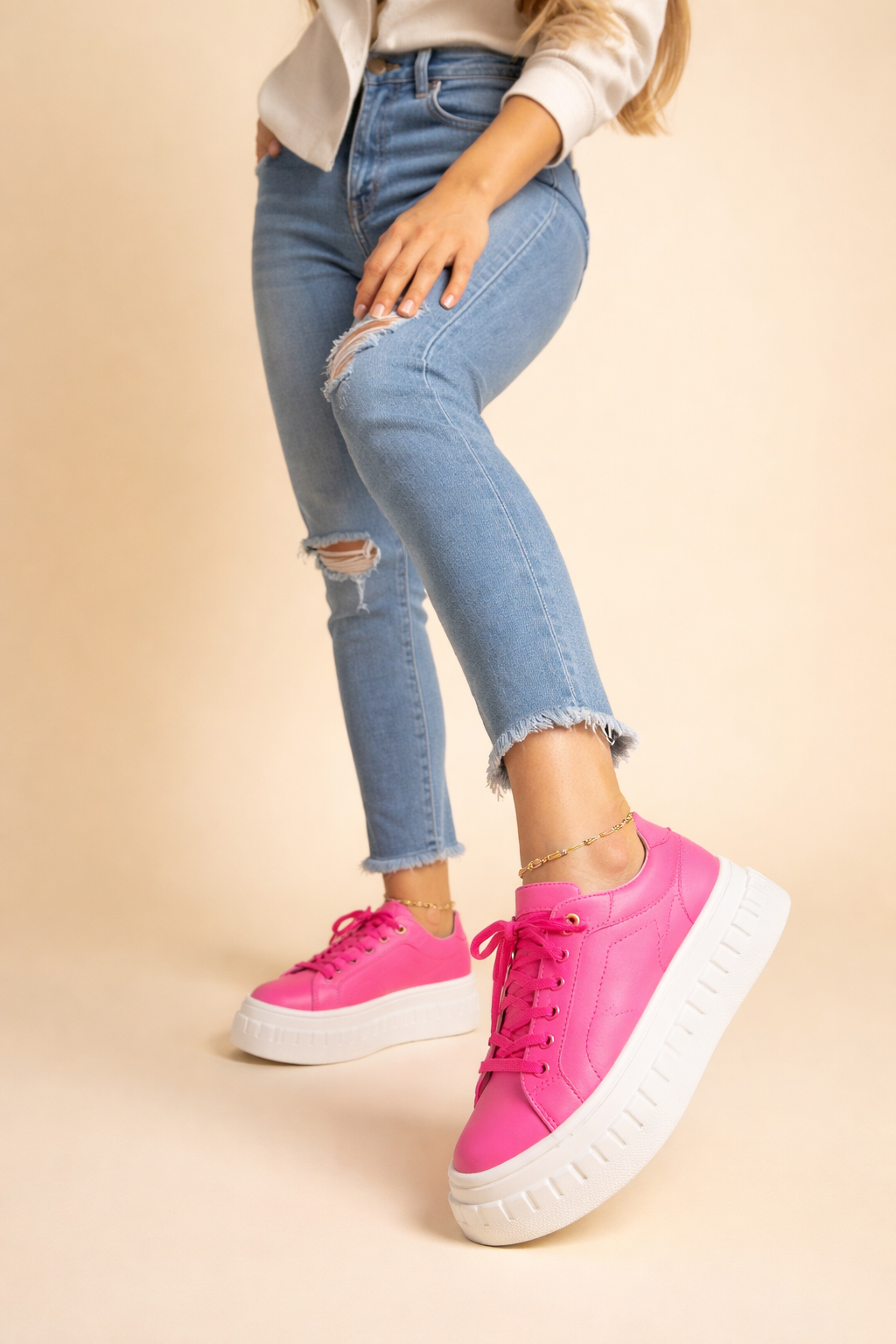 Women's platform sneakers with cushioned sole. Comfortable, stylish lace-up footwear for trendy casual fashion.