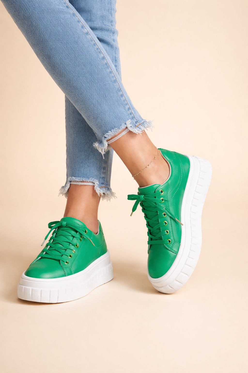 Modern women's platform sneakers with cushioned sole and trendy design for stylish casual outfits.
