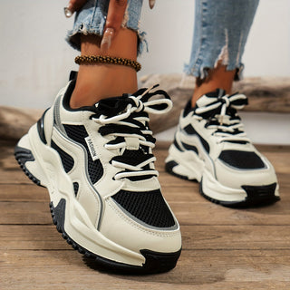 Women's platform sneakers with thick sole, perfect for an elevated, trendy casual look.