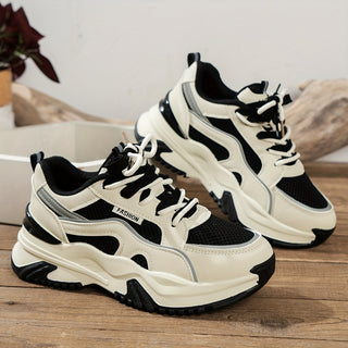 Fashion-forward women's platform sneakers with a thick sole, ideal for street style.
