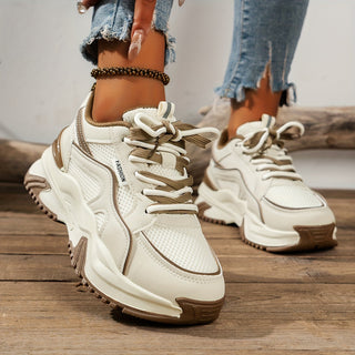 Trendy ladies platform sneakers with a thick sole, great for comfortable daily wear.