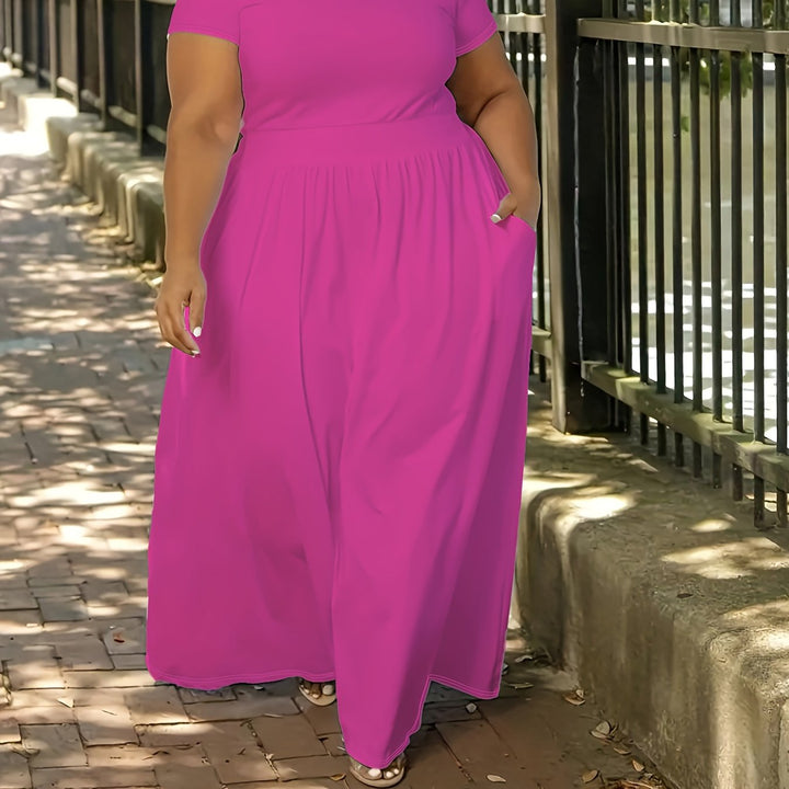 Graceful flowy short sleeve maxi dress for plus size women, moving beautifully.
