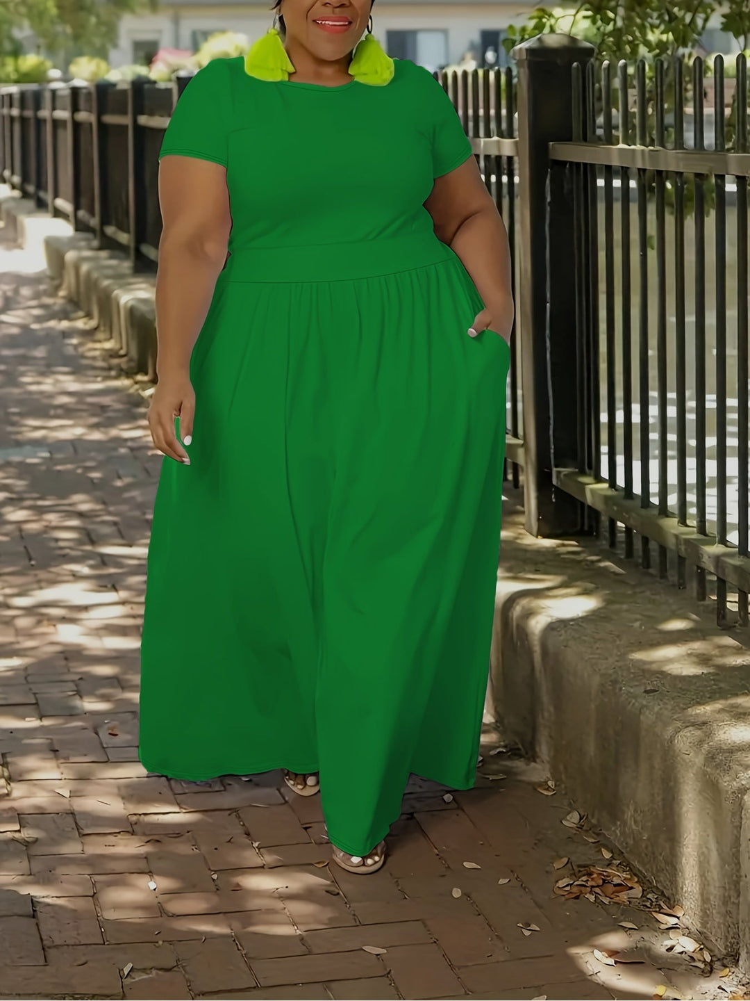 Elegant plus size flowy short sleeve maxi dress, ideal for casual or dressy occasions.