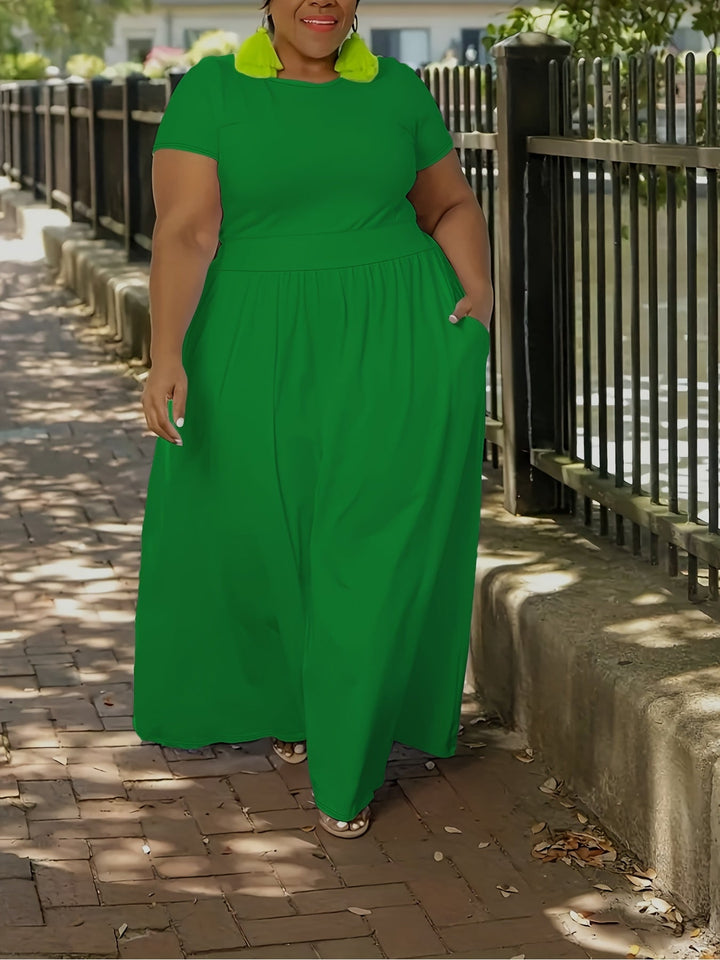 Elegant plus size flowy short sleeve maxi dress, ideal for casual or dressy occasions.